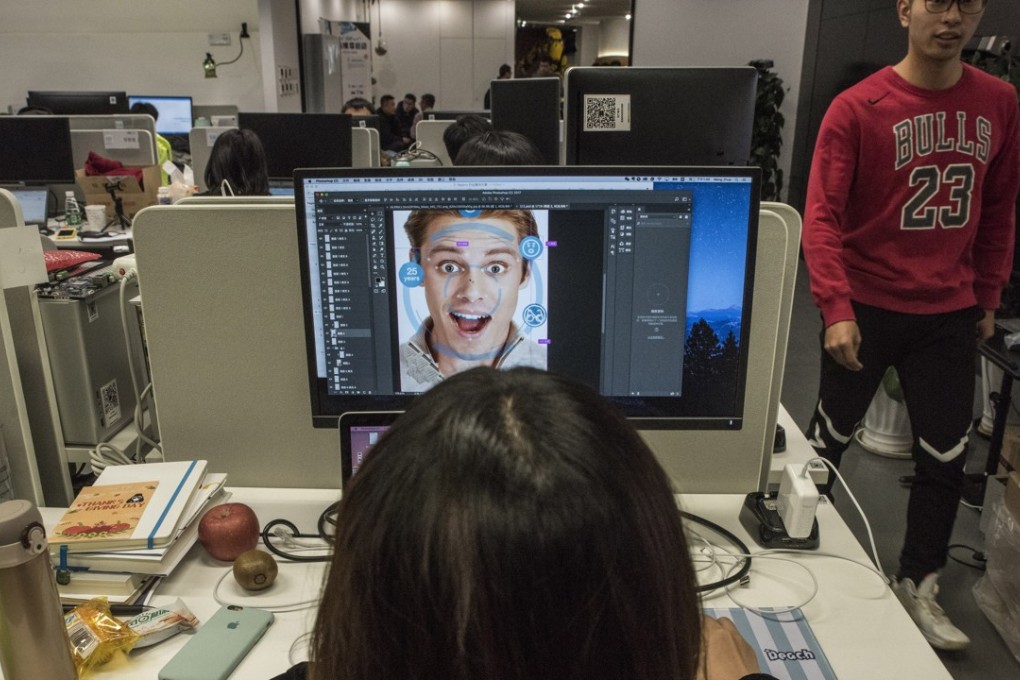 At Megvii offices in Beijing, a designer prepares marketing material for a facial-recognition product. Photo: The Washington Post/Gilles Sabrie