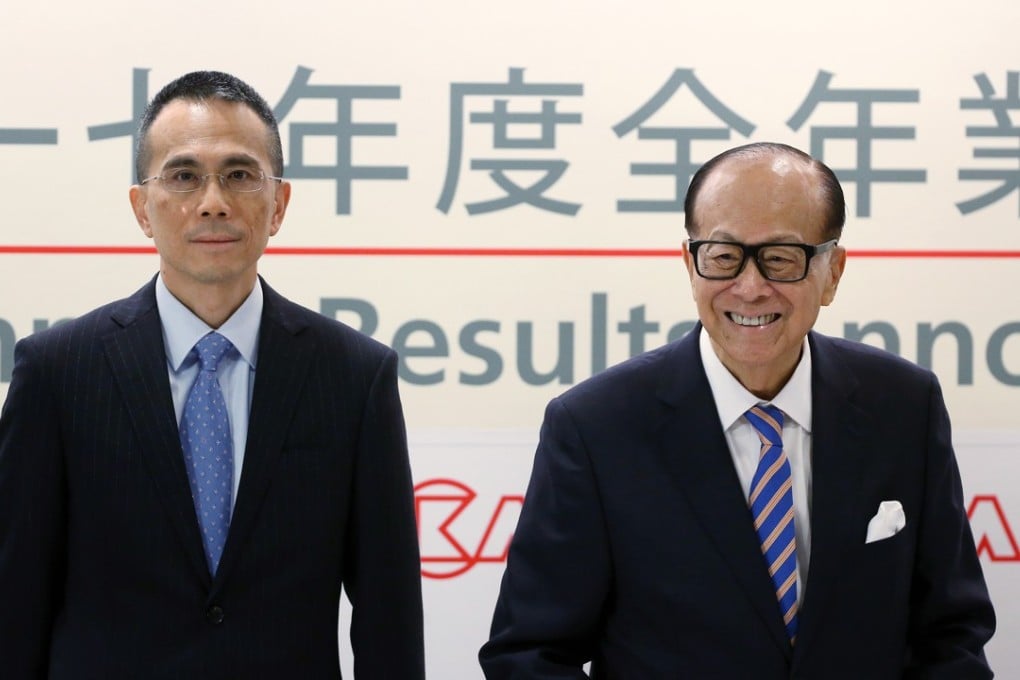 Victor Li Tzar-kuoi (left) and his father Li Ka-shing pictured at the CK Hutchison Holdings Limited and CK Asset Holdings 2017 annual results announcement in Central. Victor Li took over from his father as chairman of the two companies in March. Photo: Sam Tsang