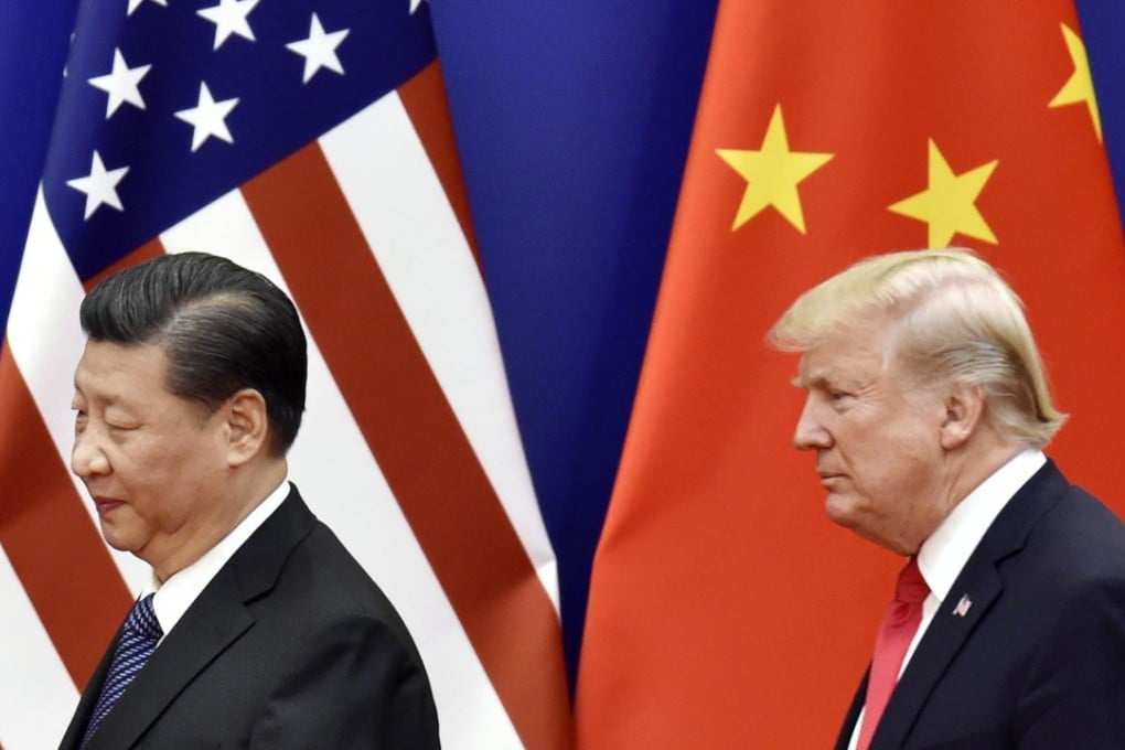 Chinese President Xi Jinping and US President Donald Trump in Beijing in October. Their trade war is starting to affect US businesses and industries. Photo: Kyodo