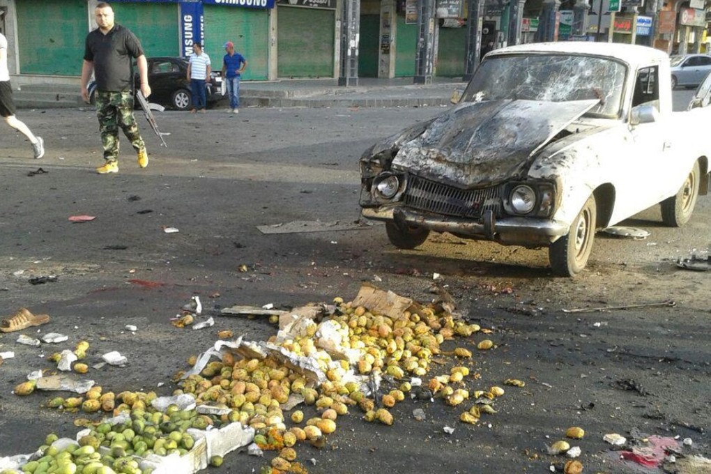 The aftermath of a suicide bomb in Sweida. Photo: Reuters