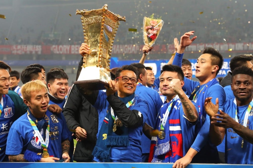 Shanghai Shenhua lift the CFA Cup last season after a two-leg win over ‘China’s Manchester United’, Shanghai SIPG. Photo: AFP