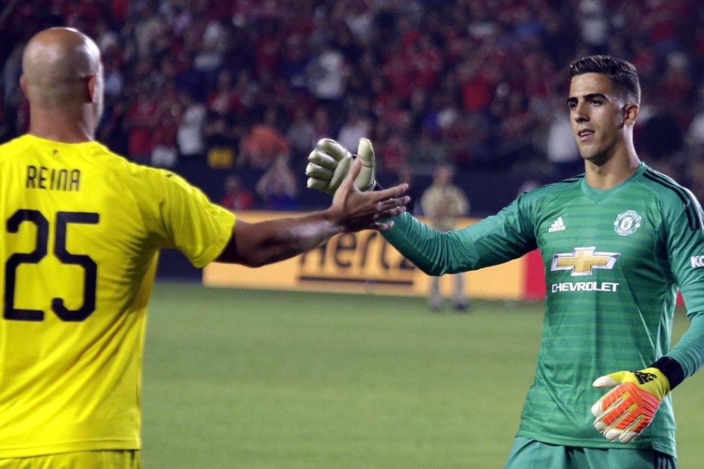 Joel Pereira (right) and AC Milan goalkeeper Jose Reina after their International Champions Cup match at the StubHub Centre. Photo: EPA