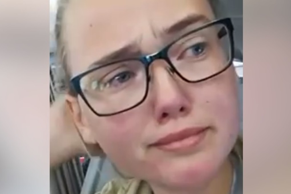 Screen capture of Elin Ersson's live feed as she stops a man's deportation on a flight. Photo: Elin Ersson/Facebook