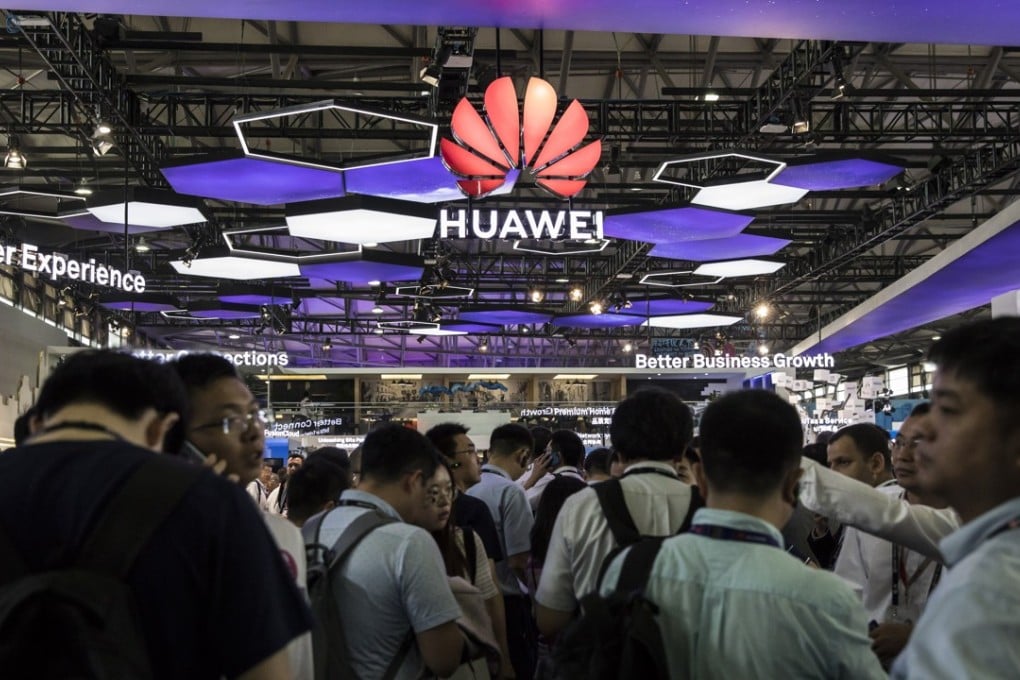 Attendees stand at the Huawei Technologies booth at the Mobile World Congress event in Shanghai, which was held in June this year. Based in Shenzhen, Huawei is the world’s largest telecommunications equipment supplier and China’s biggest smartphone brand. Photo: Bloomberg