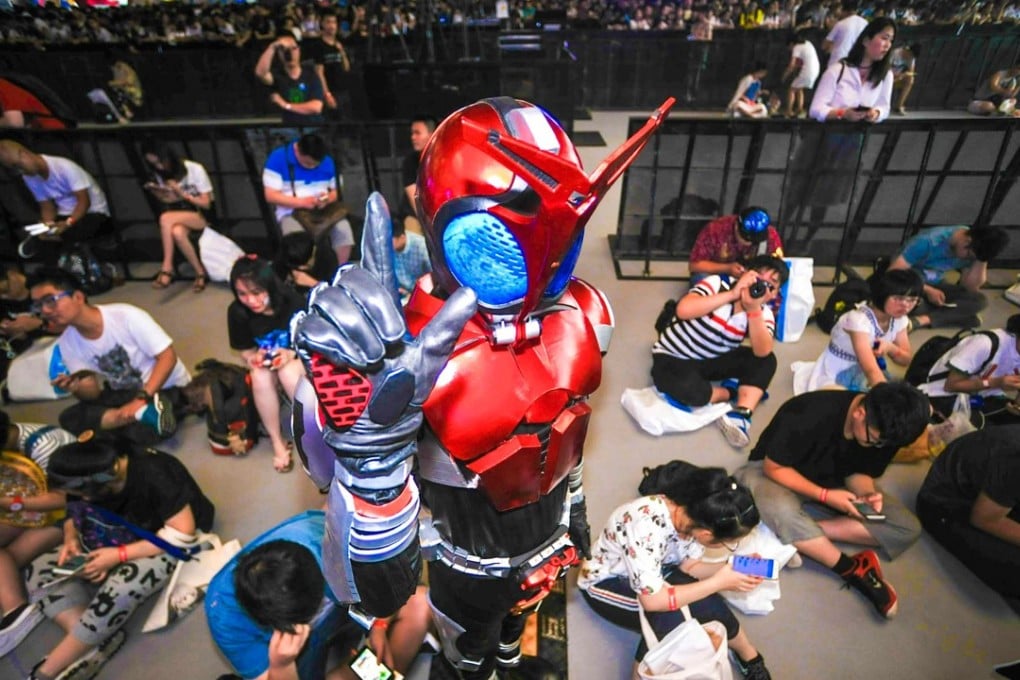 A costumed participant attends the Bilibili Macro Link 2017 annual convention of animation, comics and games in Shanghai. After criticism for inappropriate content, the video site said it will increase self checking on published content. Photo: AFP