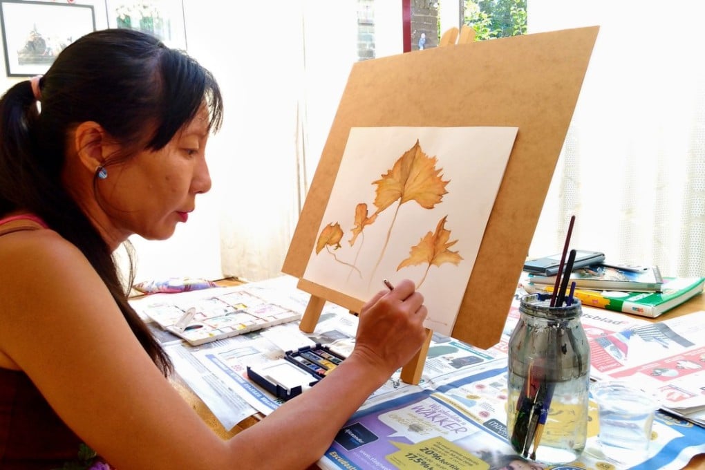 Agnes Gerrits-Lim says that her emotional wellbeing has improved since taking up painting five years ago.