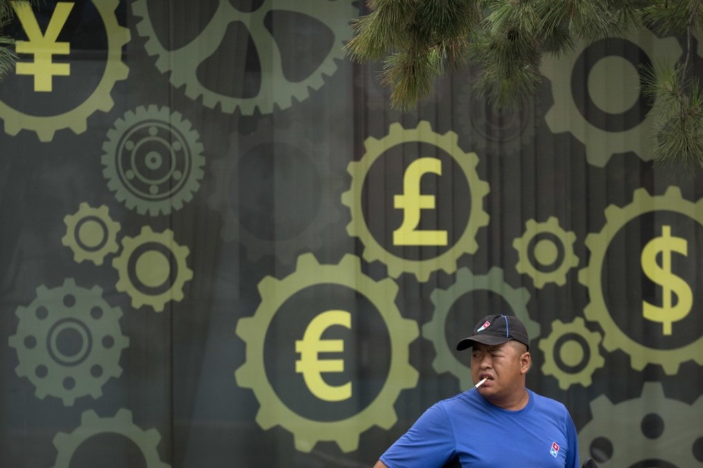 China’s central bank is allowing its tightly controlled yuan to drift lower against the dollar, a move that could help some exporters cope with US tariffs. Photo: AP