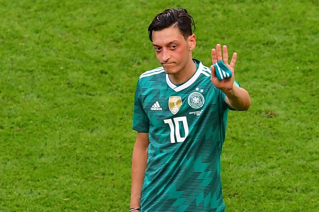 Mesut Ozil reacts at the end of the Russia 2018 World Cup Group F football match between South Korea and Germany. Photo: AFP
