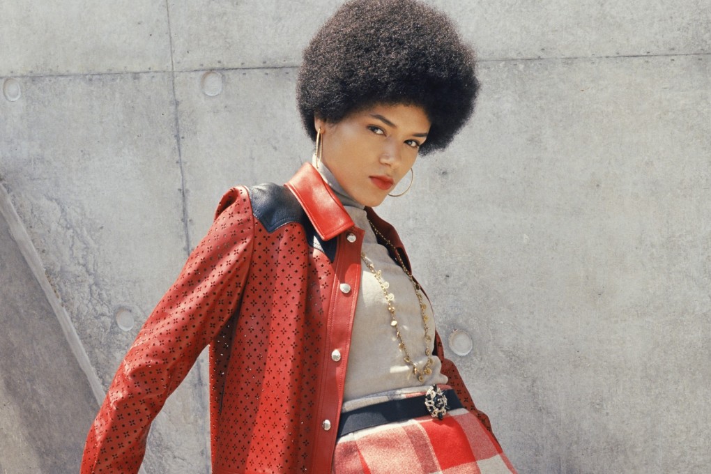 Working wardrobes trip back to the 70s, knee highs, capes and all. Can you dig it?