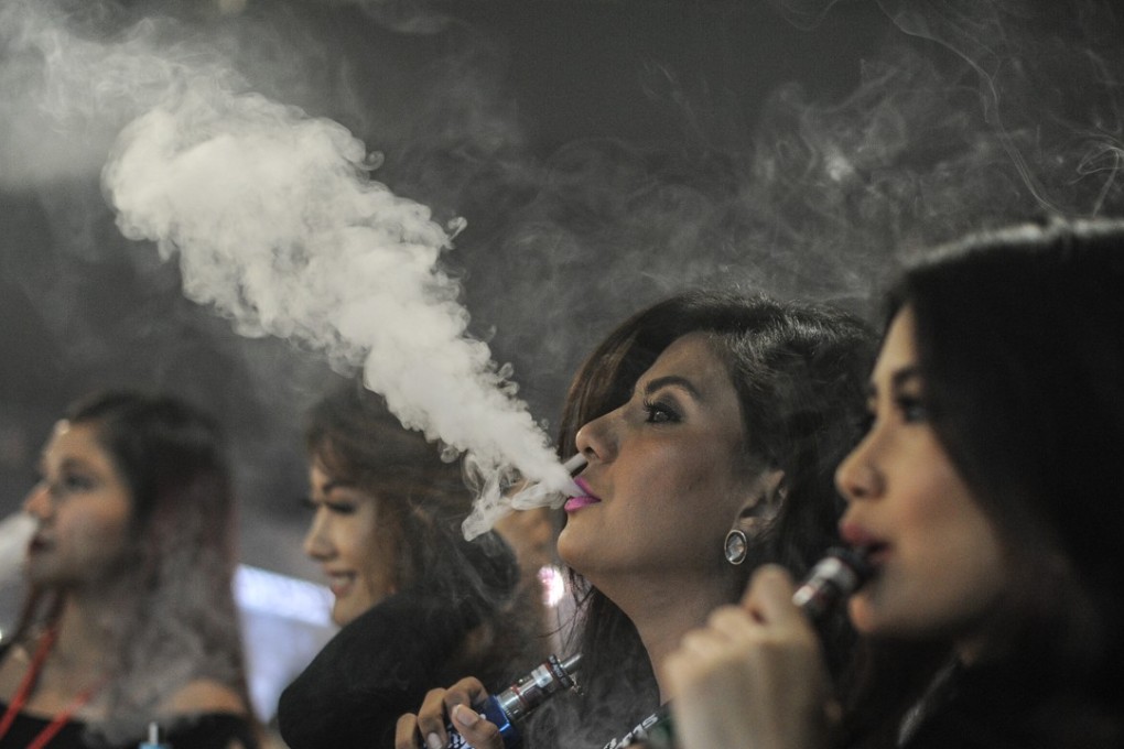 Electronic cigarettes being showcased at VapeFair, an annual industry event, in Kuala Lumpur in December 2015. The Hong Kong government has proposed to regulate e-cigarettes in the same manner as regular cigarettes. Photo: AFP