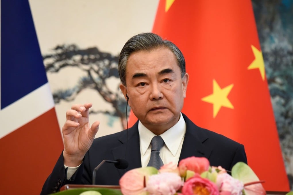 Foreign Minister Wang Yi said China and the US should resolve trade frictions through the WTO framework. Photo: AFP