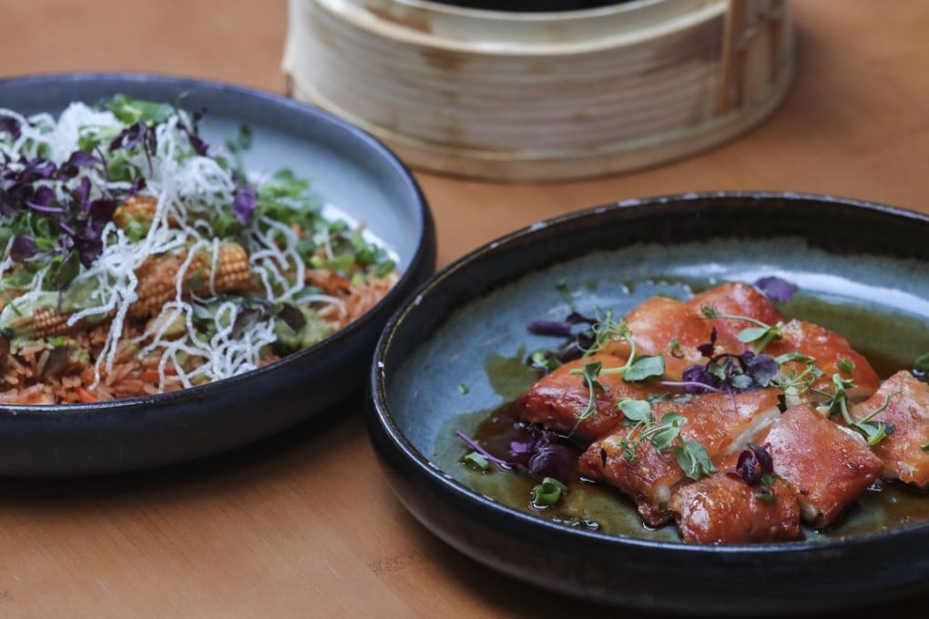 Despite its name, non-dumpling dishes such as veggie chaufa rice (left) and suckling pig were the ones we liked most at Chifa Dumpling House in Central. Photo: Jonathan Wong