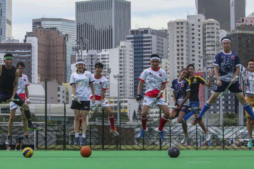 The University of Hong Kong Quidditch Club take to the air at the Happy Valley Sports Ground. Photo: David Wong