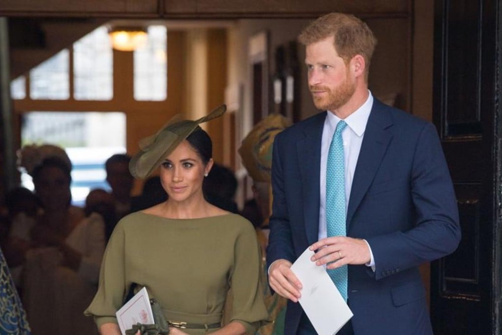 Prince Harry, Duke of Sussex and Meghan, Duchess of Sussex, wearing an olive-green Ralph Lauren dress at the christening of Britain's Prince Louis. Picture: AFP
