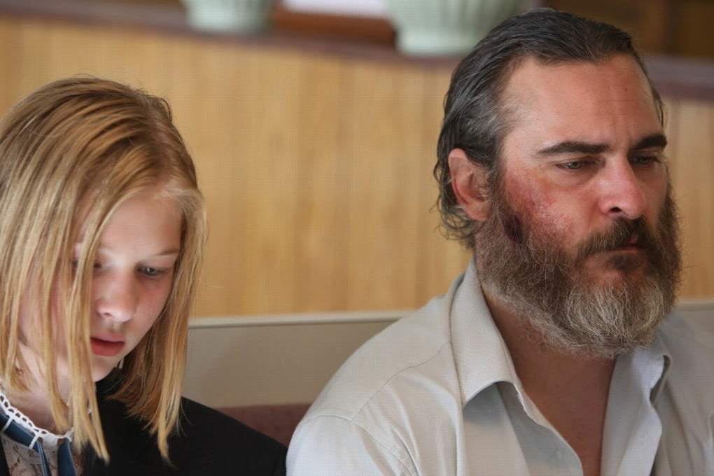 Joaquin Phoenix (right) and Ekaterina Samsonov in You Were Never Really Here.