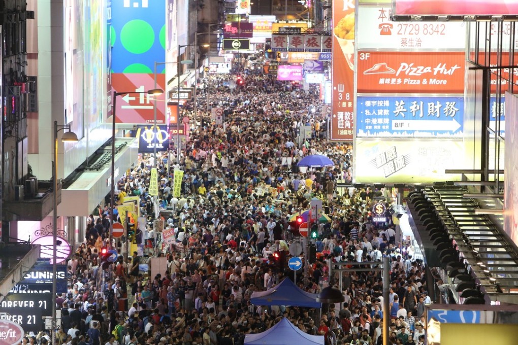 Sai Yeung Choi Street South in Mong Kok was a sea of humanity on the last night of the pedestrian zone. Photo: Dickson Lee