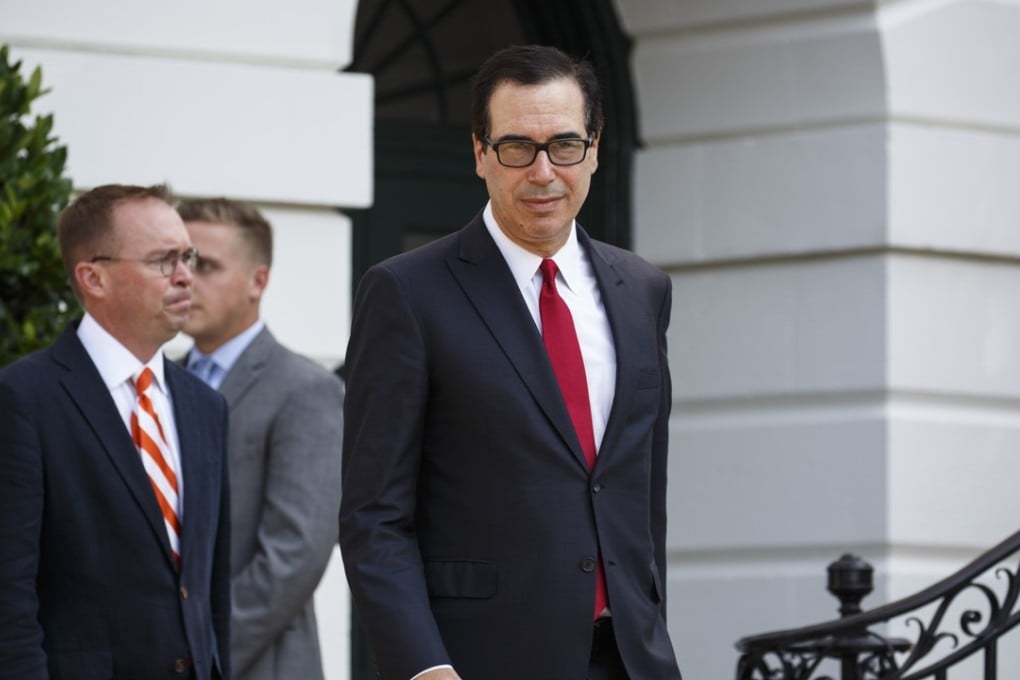 Mick Mulvaney, director of the Office of Management and Budget, left, and Steven Mnuchin, US. Treasury secretary, arrive at the White House on Friday. Photo: Bloomberg