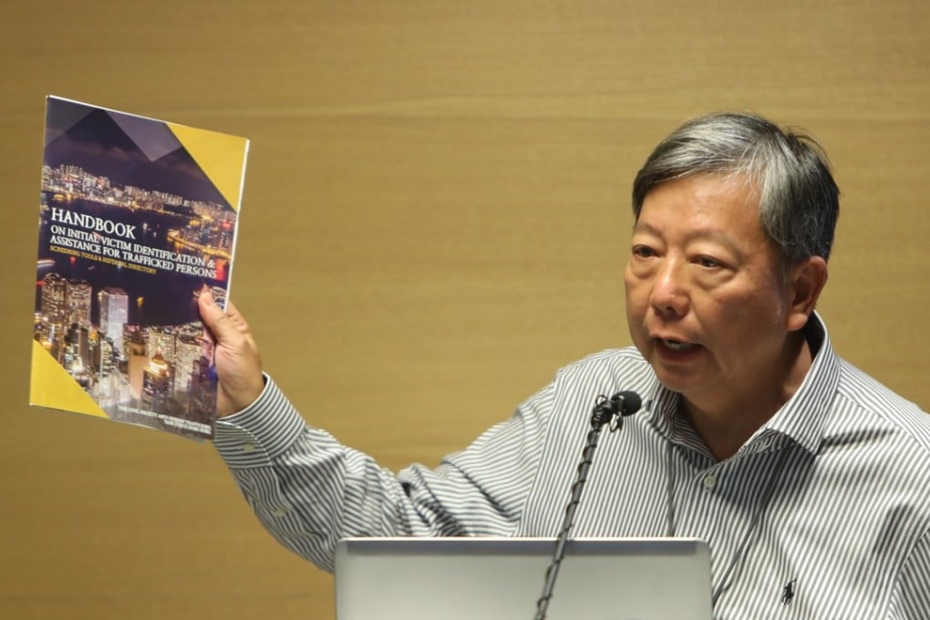 Lee Cheuk-yan, general secretary of the Hong Kong Confederation of Trade Unions, attends presser on An anti-human trafficking group release a guidebook on how to differentiate human trafficking victims at Central. Photo: Winson Wong