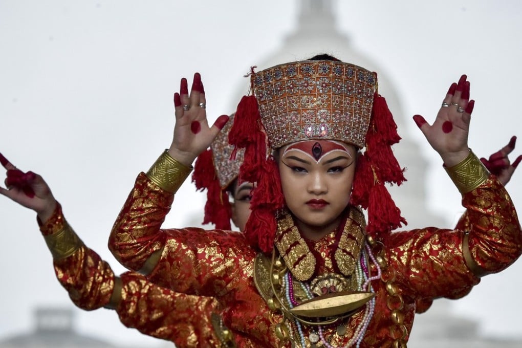 The Nritya Mandap troupe performs a Nepali dance in front of the United States Capitol building in Washington, in the United States. Picture: Bill O’Leary for The Washington Post