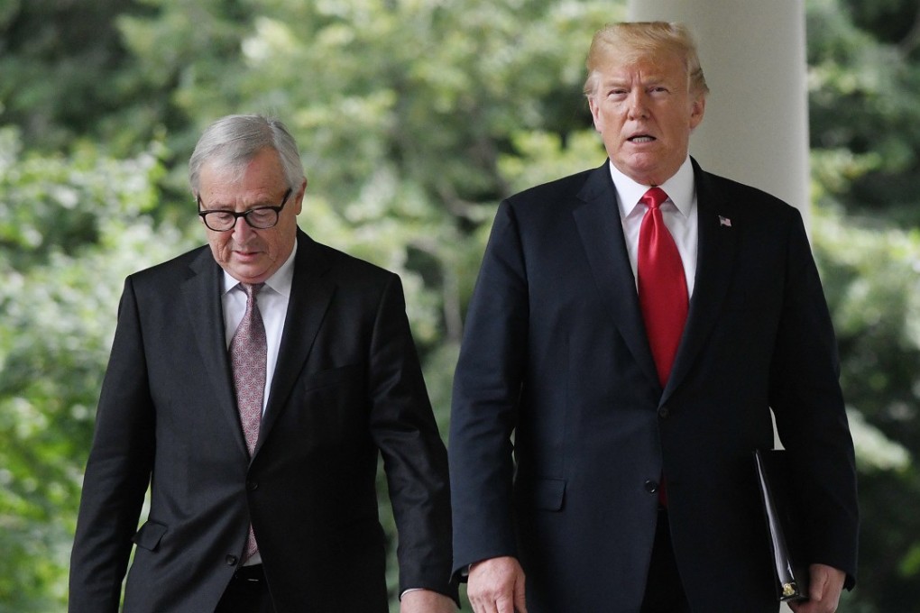 US President Donald Trump (right) and European Commission president Jean-Claude Juncker walk to a press conference on July 25 in the Rose Garden at the White House in Washington. Photo: Abaca Press / TNS