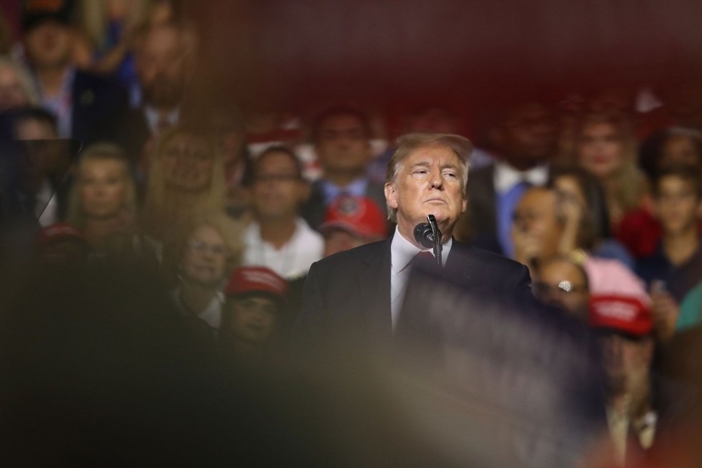 US President Donald Trump speaks during a campaign rally at the Florida State Fairgrounds Expo Hall in Tampa, Florida, on Tuesday. Photo: Agence France-Presse