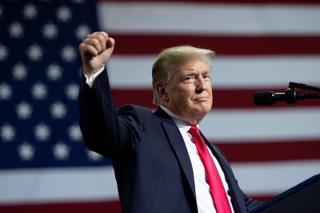 US President Donald Trump speaks during a campaign rally at the Florida State Fairgrounds Expo Hall in Tampa, Florida, on Tuesday. Photo: Agence France-Presse