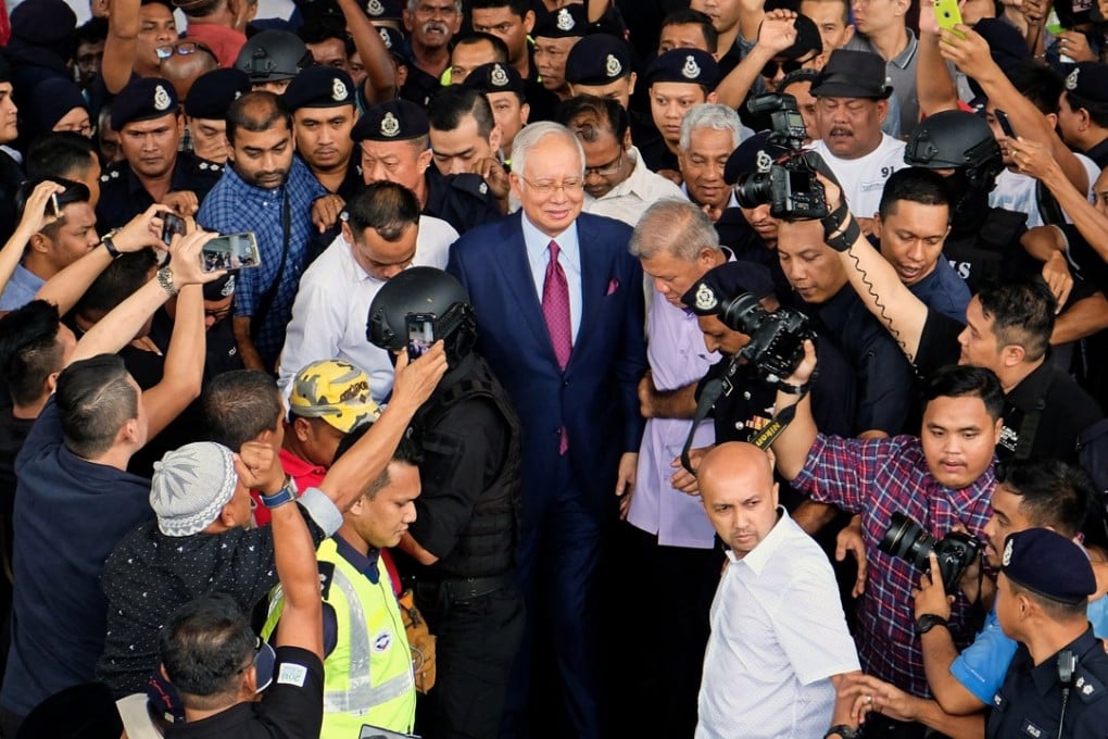 Najib Razak, Malaysia's former prime minister, leaves the Kuala Lumpur Courts Complex in Kuala Lumpur on Wednesday, July 4, 2018. Najib pleaded not guilty to charges of corruption and criminal breach of trust in connection with a multibillion-dollar scandal surrounding state fund 1MDB. Photo: Samsul Said/Bloomberg