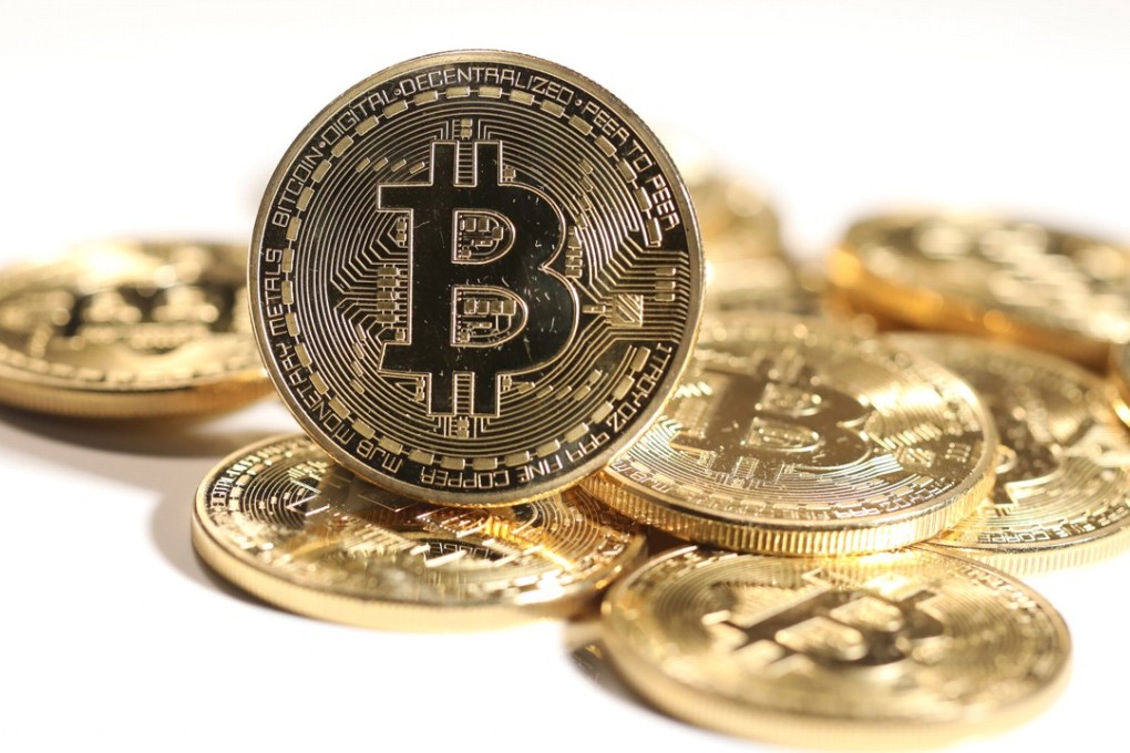 A pile of coins representing cryptocurrency bitcoin sit grouped together in this arranged photograph in London. Cryptocurrencies tracked by Coinmarketcap.com have lost more than US$500 billion of market value since early January as governments clamped down, credit-card issuers halted purchases and investors grew increasingly concerned that last year's meteoric rise in digital assets was unjustified. Photo: Bloomberg