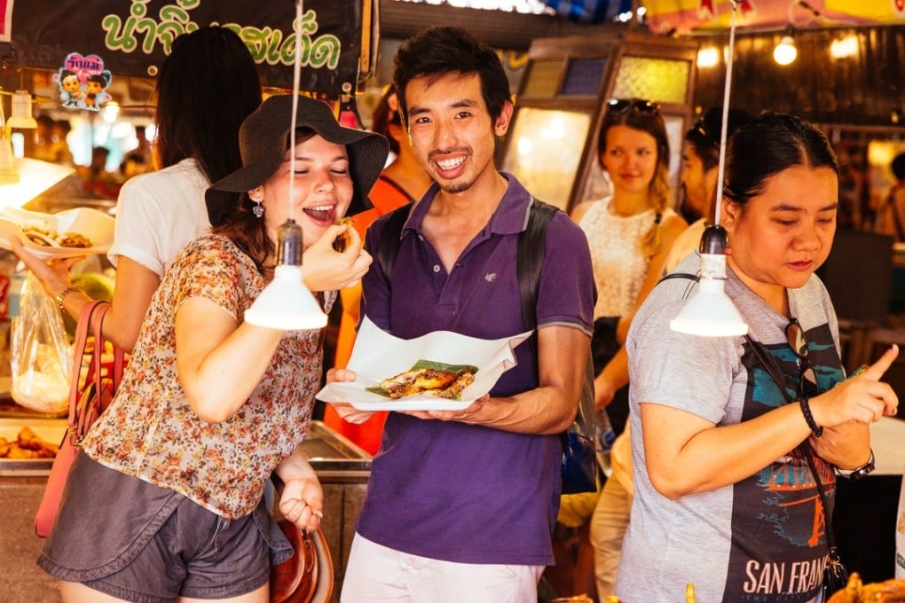 Tourist and guide on WithLocals’ “Gordon Ramsay’s Favourite Thai Food Tour” in Bangkok.