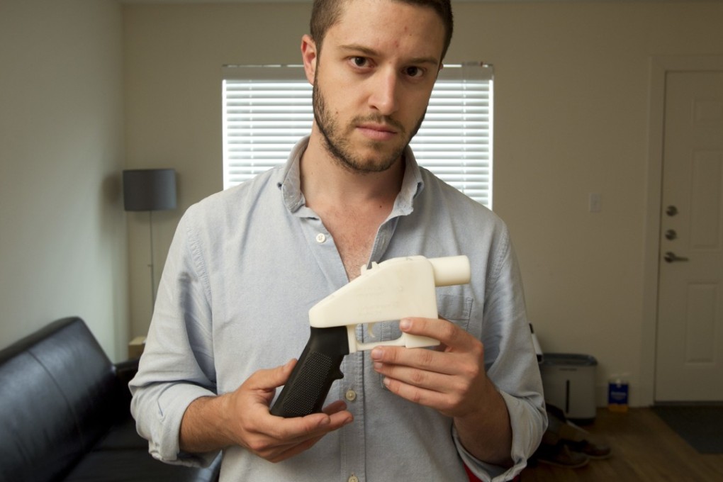 In this May 10, 2013, file photo, Cody Wilson, the founder of Defense Distributed, shows a plastic handgun made on a 3D-printer at his home in Austin, Texas. Photo: AP