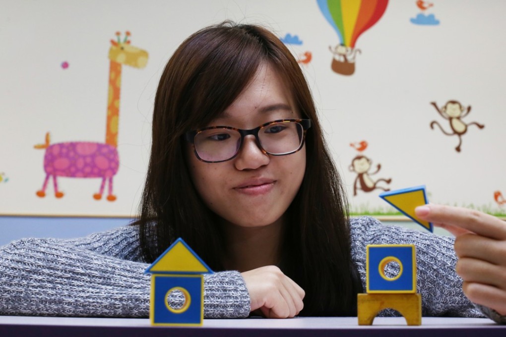 The parents of Yeliz Chu Ka-wai divorced when she was barely five years old. As part of a pilot programme in 2015, Chu, then 22 and a university student, mentored young children from single-parent families. Photo: Nora Tam