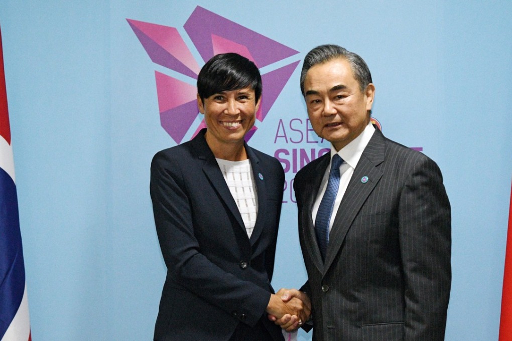 Chinese Foreign Minister Wang Yi meets Norwegian Foreign Minister Ine Eriksen Soreide in Singapore. Photo: Xinhua