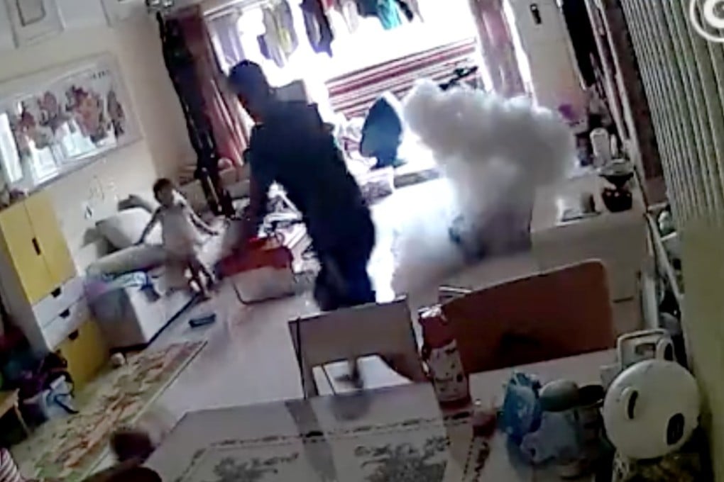 Smoke bursts from the electric scooter after it suddenly exploded inside a home in Beijing while charging. Photo: weibo