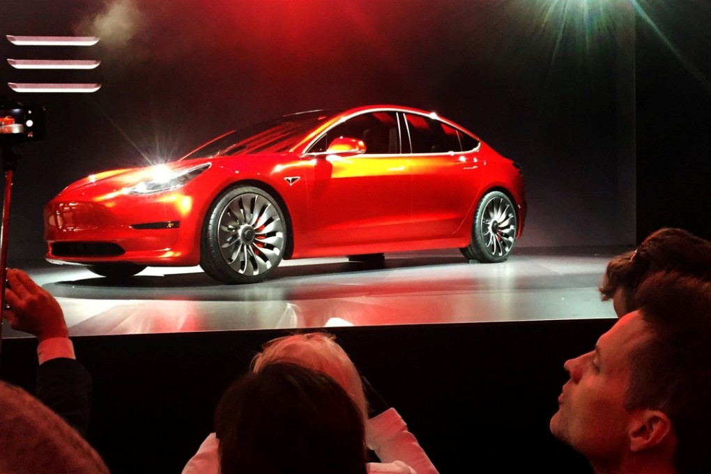 A Tesla Model 3 sedan, its first car aimed at the mass market, is displayed during its launch in Hawthorne, California. Photo: Reuters
