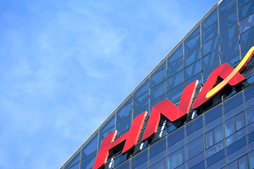 HNA Group’s logo on the building of HNA Plaza in Beijing on February 9, 2018. Photo: REUTERS
