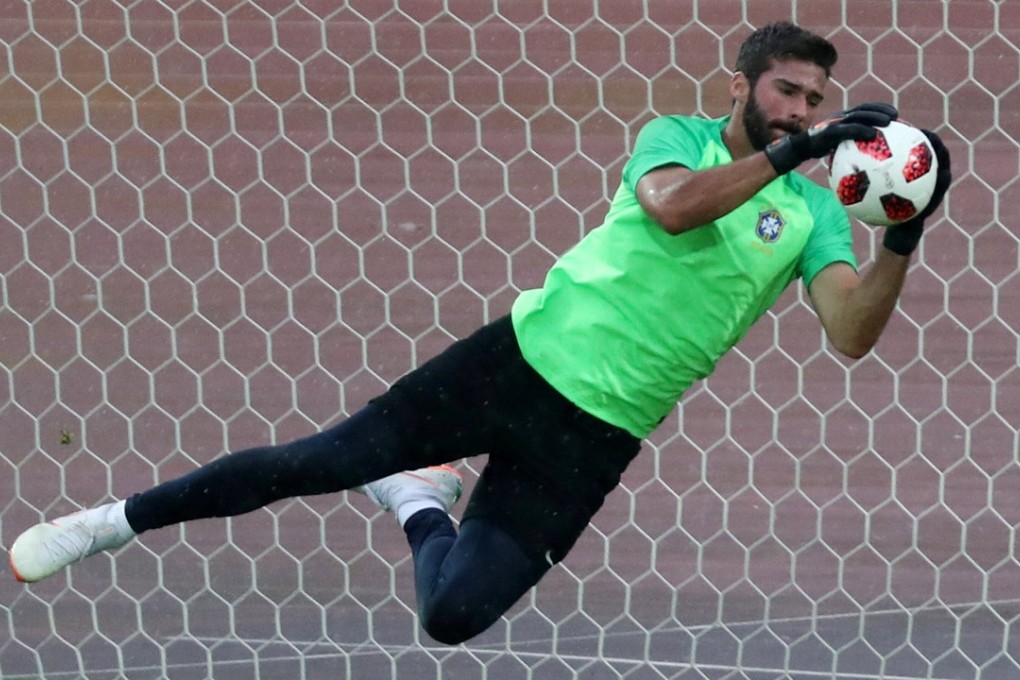 Alisson has been training with Liverpool for almost a week and will make his debut on Saturday. Photo: Reuters