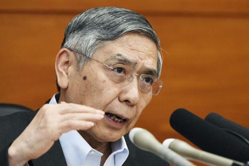 Bank of Japan governor Haruhiko Kuroda speaks at a press conference at the central bank's headquarters in Tokyo on July 31, following a two-day meeting of its policy board. The BOJ decided to make its massive monetary stimulus more flexible by allowing long-term interest rates to rise slightly higher. Photo: Kyodo