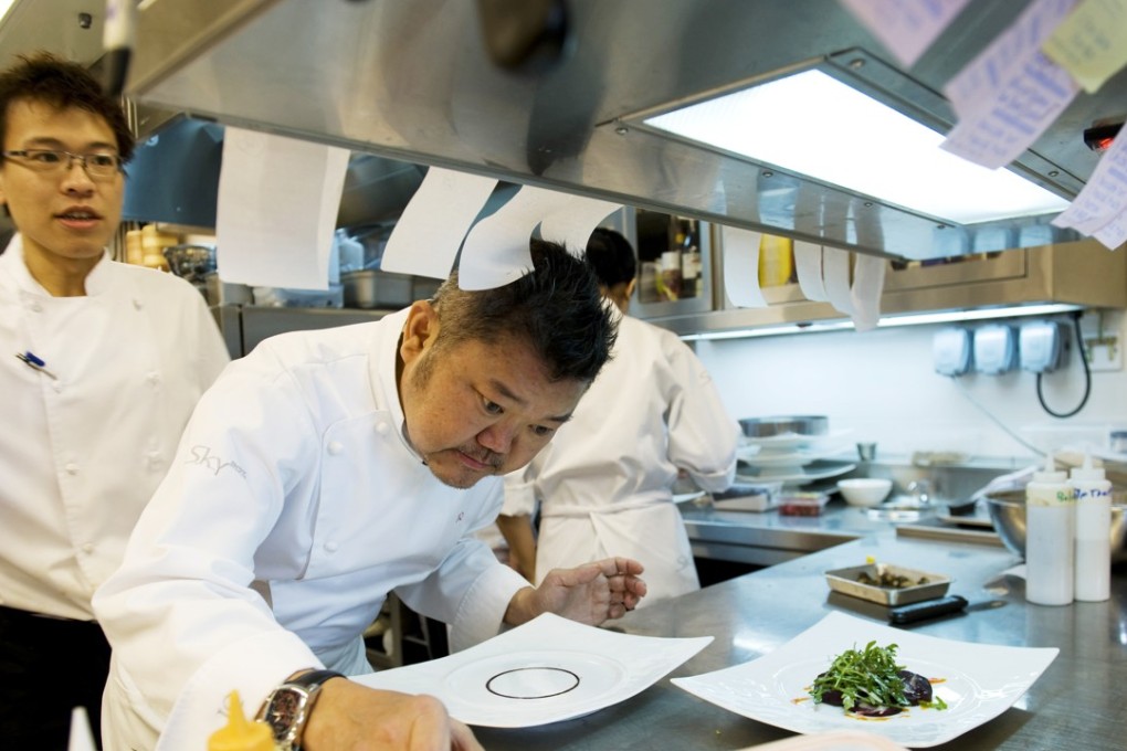 Singaporean celebrity chef Justin Quek prepares a dish at Singapore’s Marina Bay Sands resort. Photo: AFP