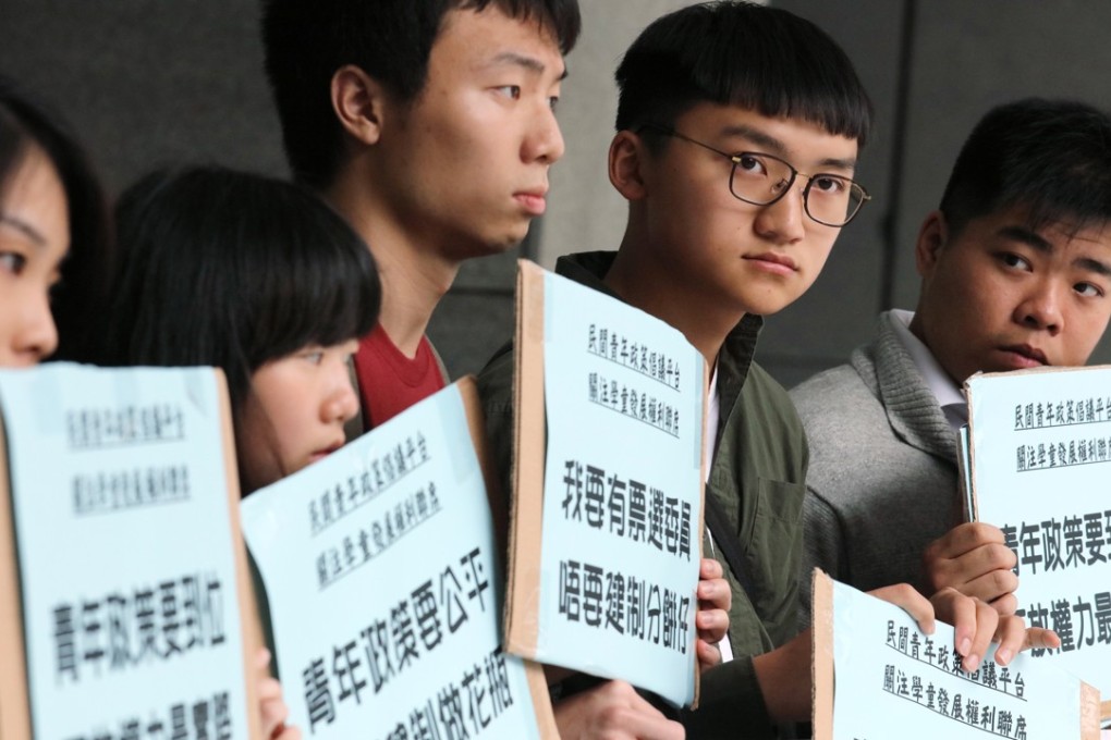 Concern group Youth Policy Advocators protests against the Youth Development Commission, a new high-level government advisory body, outside the government headquarters in Admiralty on April 24. Their demands for reform of the commission included places for elected youth representatives. Photo: Felix Wong