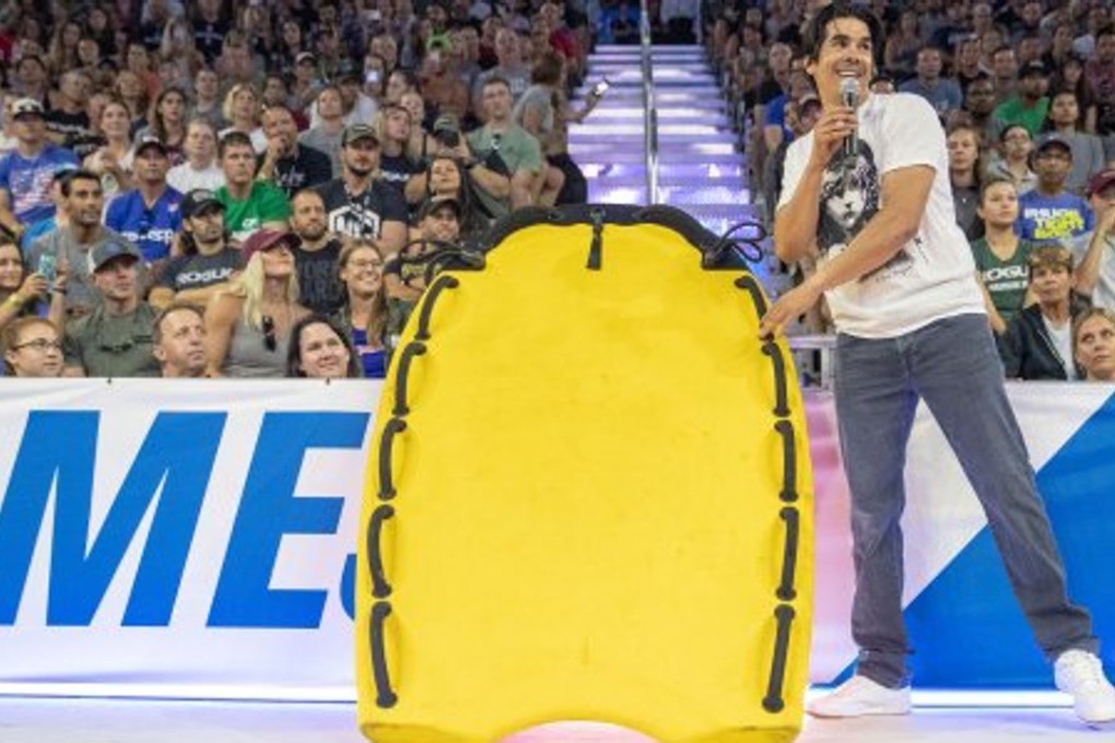 Dave Castro unveils the rescue sled that will be used for the team swim event on Saturday. Photos: Twitter/@CrossFitGames