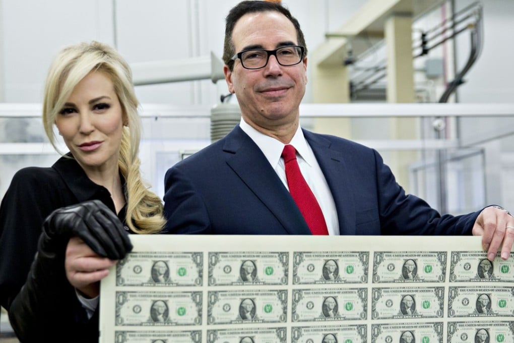 US Treasury Secretary Steven Mnuchin, an investment banker before joining the Trump administration, roused public criticism when he and his wife, Louise Linton posed with a sheet of uncut dollar notes in November 2017, with observers comparing them to “Bond villains”. Photo: Bloomberg