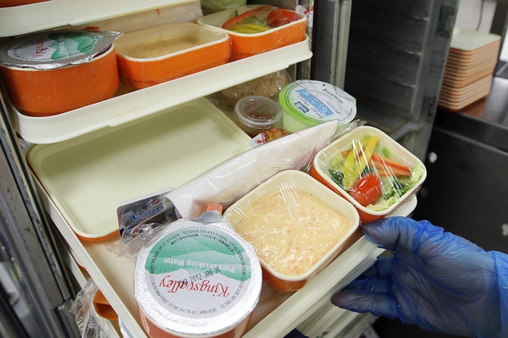 Airline meals, especially in economy class, involve a lot of plastic packaging and disposable cutlery. Photo: Edward Wong