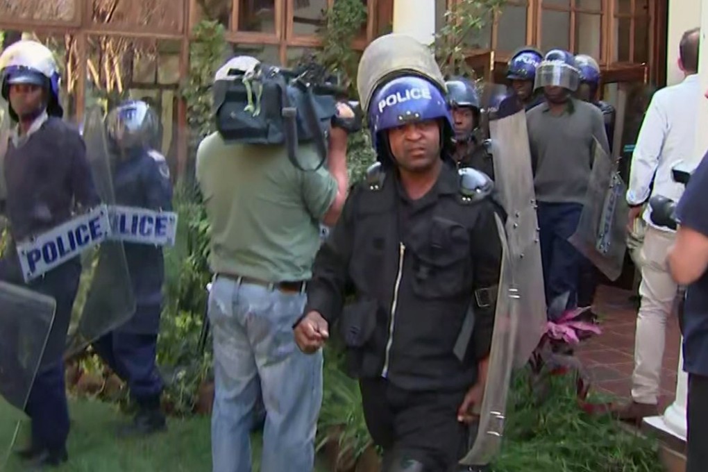 Riot police at a press conference by opposition leader Nelson Chamisa in Harare on Friday, August 3, 2018. Photo: AP