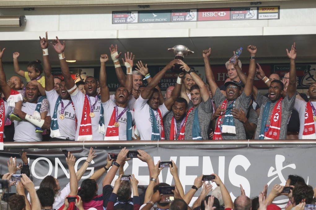 Gareth Baber holds the Cup aloft at the Hong Kong Sevens. Photo: K.Y. Cheng