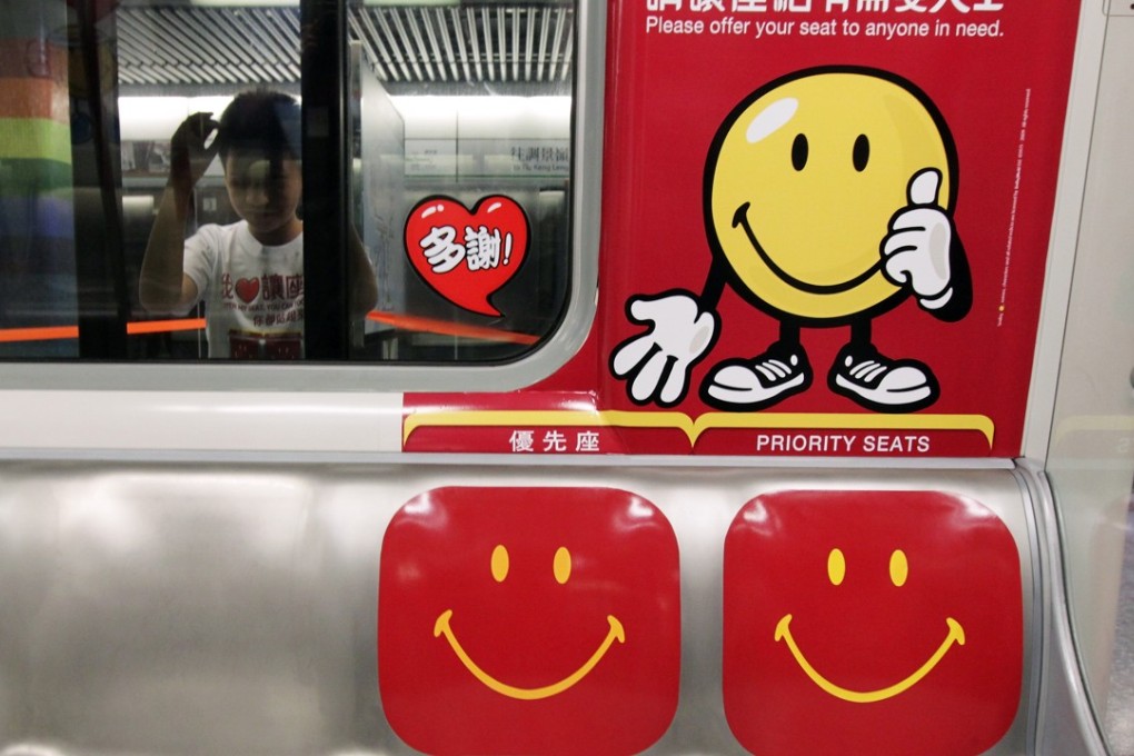 The MTR “priority seats” campaign was launched as far back as 2010, but the jury is still out on how successful such public transport campaigns have been in creating a more polite and sympathetic commuter culture in Hong Kong. Photo: K.Y. Cheng
