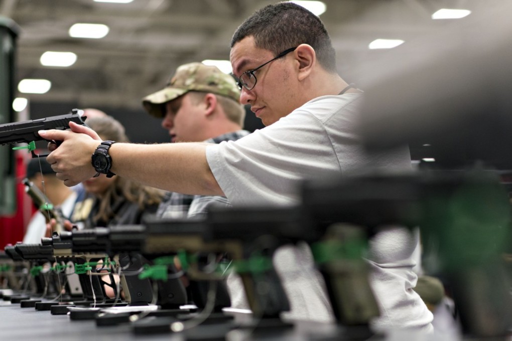 People checking guns at an NRA meeting in Dallas, Texas in May, 2018. Photo: Bloomberg