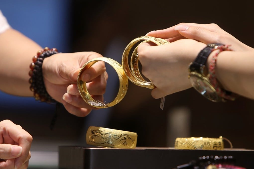 Shoppers at a TSL Jewellery store in Hong Kong’s Tsim Sha Tsui. Photo: Winson Wong