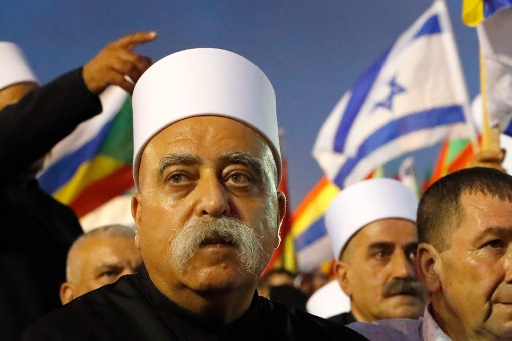 Israeli Druze spiritual leader Sheikh Muwafaq Tarif at a rally in Tel Aviv on Saturday where members of his community and their supporters protested against the “Jewish Nation-State Law”. Photo: AFP