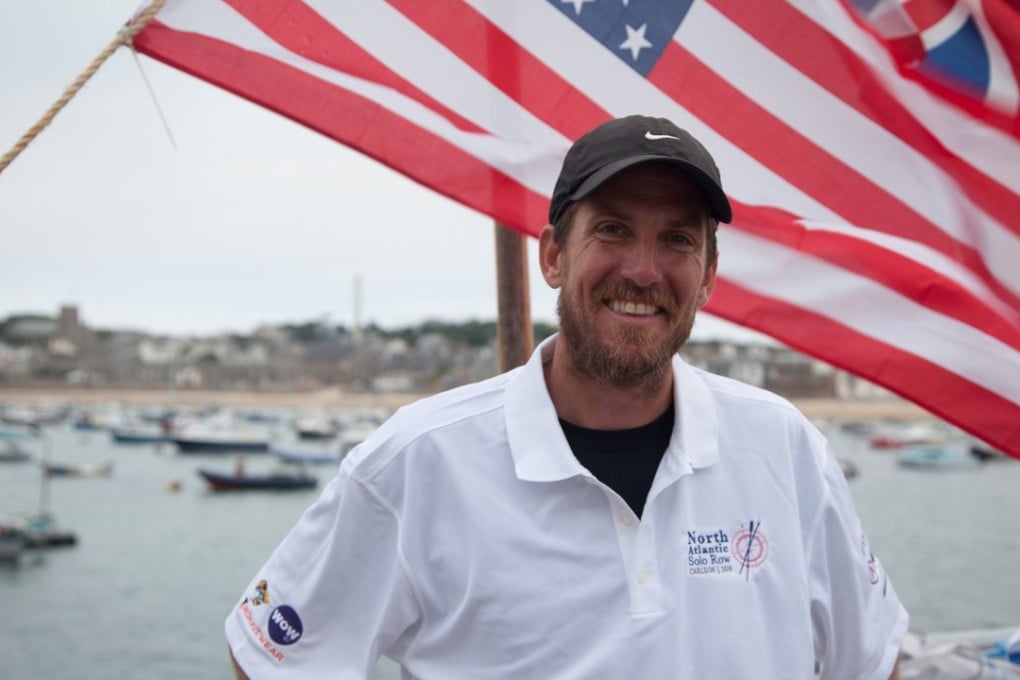 Bryce Carlson, a high school biology teacher, upon his arrival late Saturday at St. Mary's, on the Isles of Scilly, Britain. He rowed more than 2,000 miles (3,200 kilometres) in his 20-foot (6-metre) boat, Lucille., Photo: Handout via Reuters