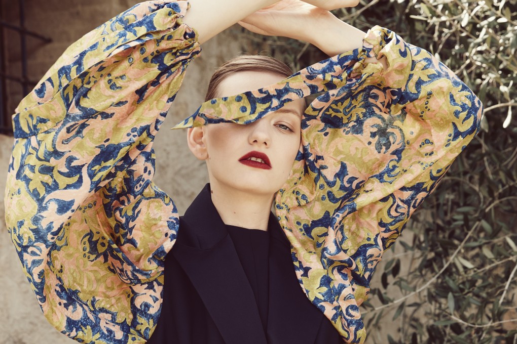 Feminine fabrics and exaggerated silhouettes in the Tuscan countryside